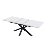 tavolo rettangolare allungabile rob con piano bianco e gambe in metallo nero, vista ambientata in spazi open space moderni