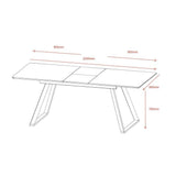 tavolo allungabile shelton con piano impiallacciato legno massiccio tinto rovere scuro e gambe in metallo nero, vista ambientata in spazi open space moderni