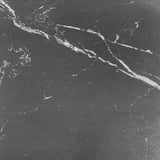 tavolo allungabile kyoto con piano in ceramica effetto marmo nero ardesia opaco e struttura in metallo nero, ideale per ospitare numerosi commensali