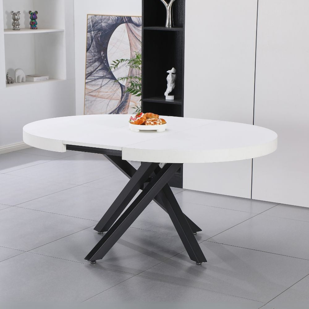 tavolo allungabile raven con piano colore bianco opaco e gambe in metallo nero, tavolo rotondo ideale per conversazioni conviviali