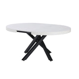 tavolo allungabile raven con piano colore bianco opaco e gambe in metallo nero, vista ambientata in sala da pranzo elegante