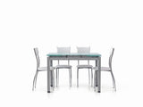 tavolo rapallo in metallo grigio con piano in vetro bianco allungabile 110×70 cm, vista ambientata con sedie abbinate