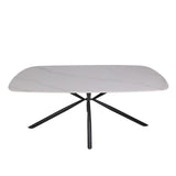 tavolo style fisso con piano in ceramica effetto marmo bianco lucido con gambe nere, dettaglio della superficie allungata e gambe robuste