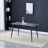 tavolo mila 140x80 con top in ceramica effetto marmo grigio opaco e gambe in metallo nero, finitura di qualità per uso quotidiano