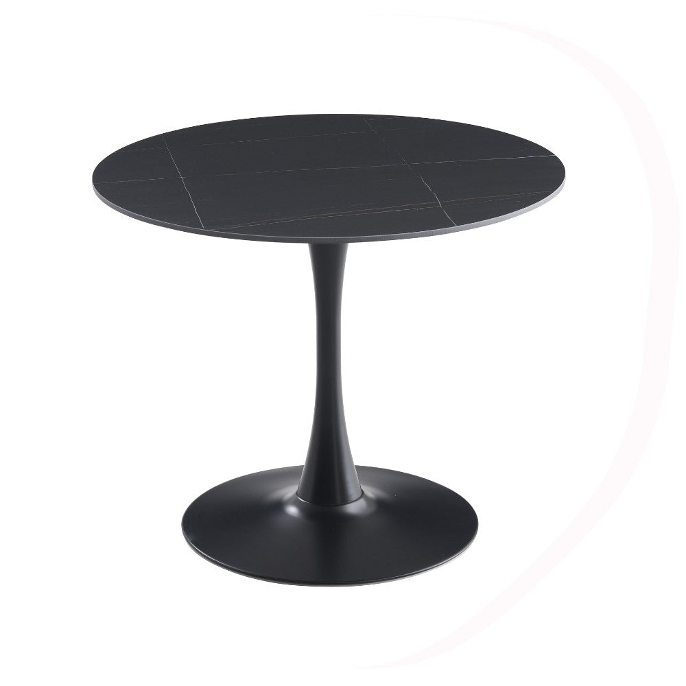 tavolo rotondo dot con piano in ceramica effetto marmo nero opaco con particolari oro e gamba nera, forma accogliente che favorisce la socialità